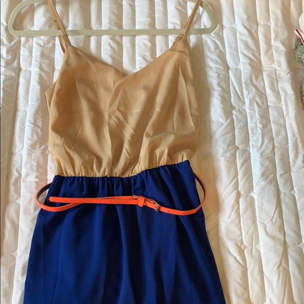 A gold/tan & blue jealous tomato romper Size small